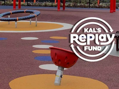 Kal's Replay Fund logo on pic of playground built on surface of recycled rubber